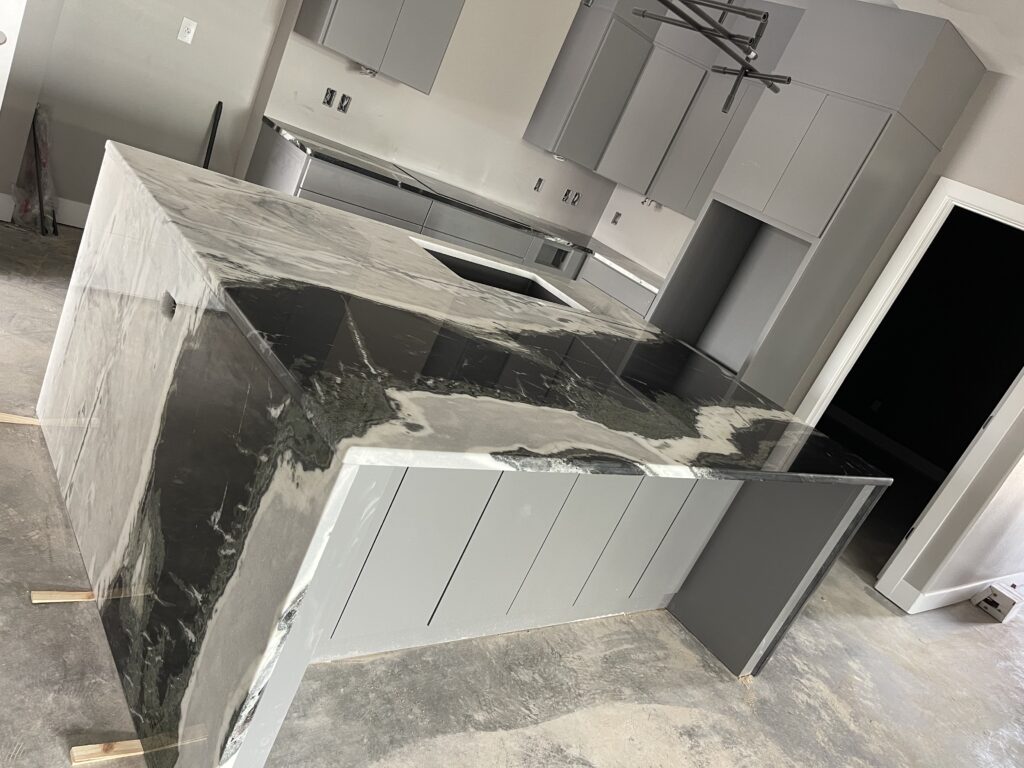 black and gray kitchen granite and countertops and island